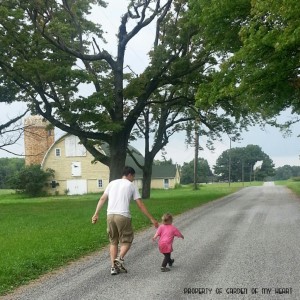 Walking toward the farm with daddy.
