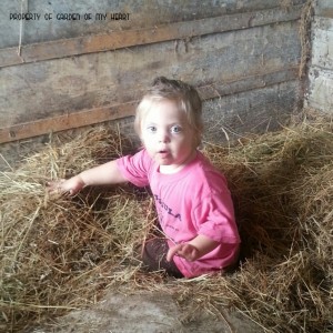 Playing in the hay.